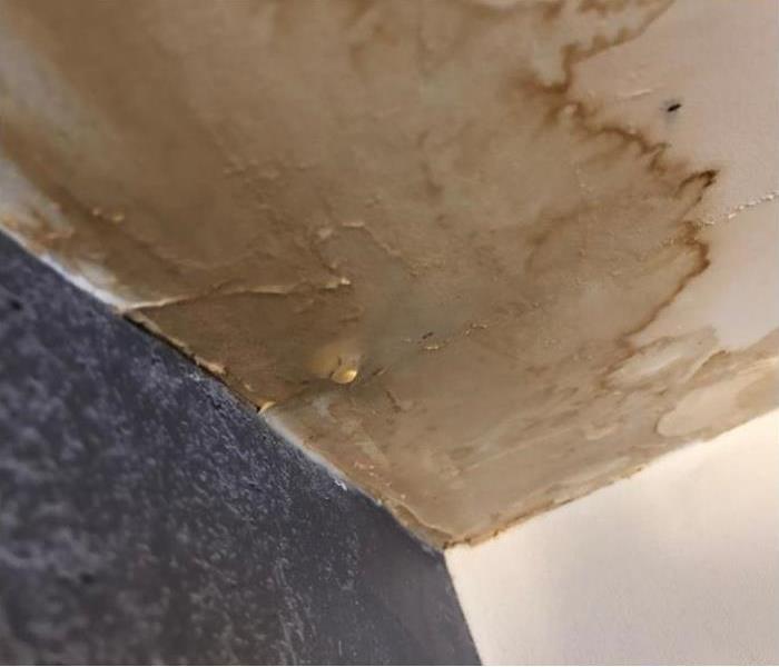 old water damage in ceiling, discoloration